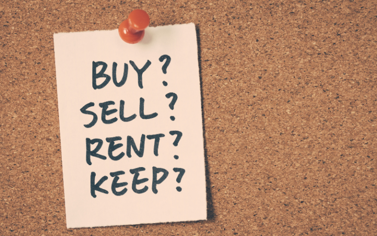 Board with Buy, Sell, Rent, Keep text