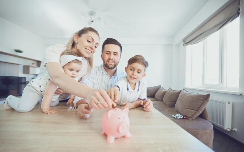 Family with piggy bank