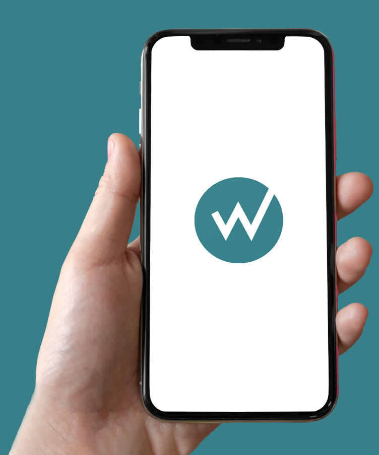 Hand holding mobile with wealth platform logo