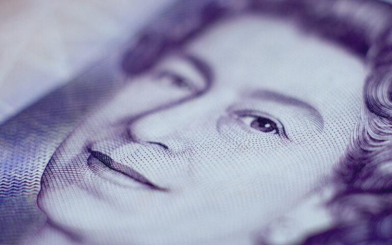 Queen face on note