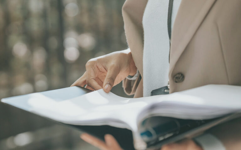 Woman looking at file