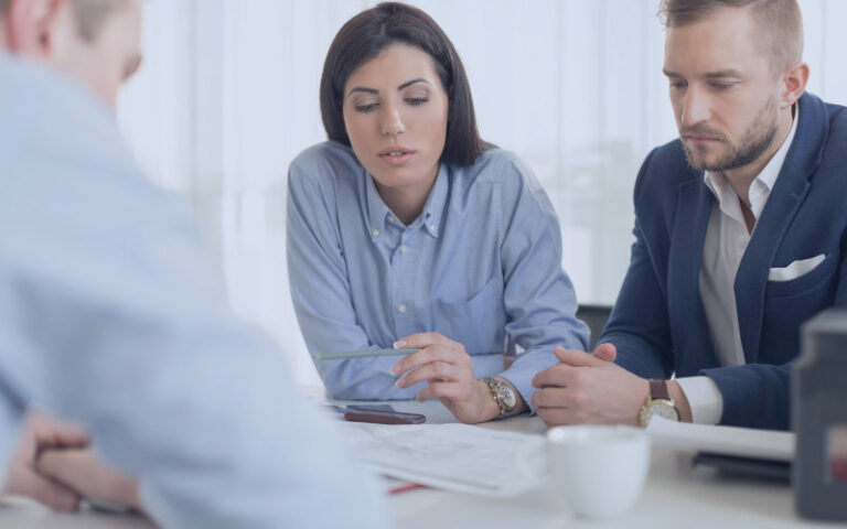 Couple in meeting with financial adviser