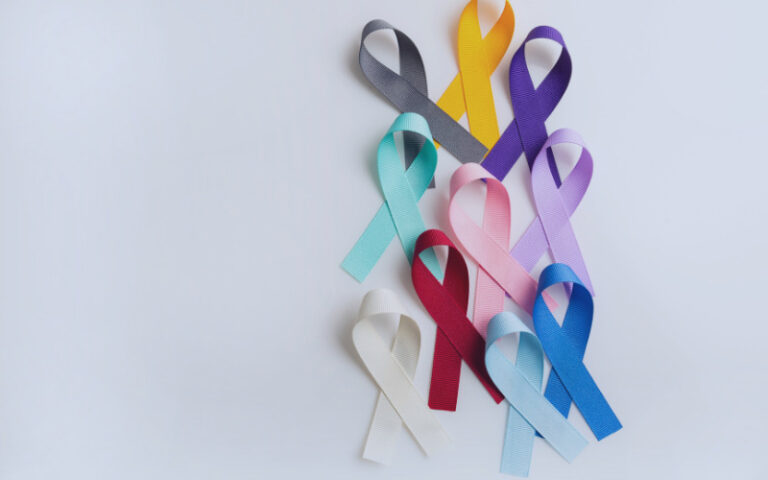 Cancer ribbons on a blank background