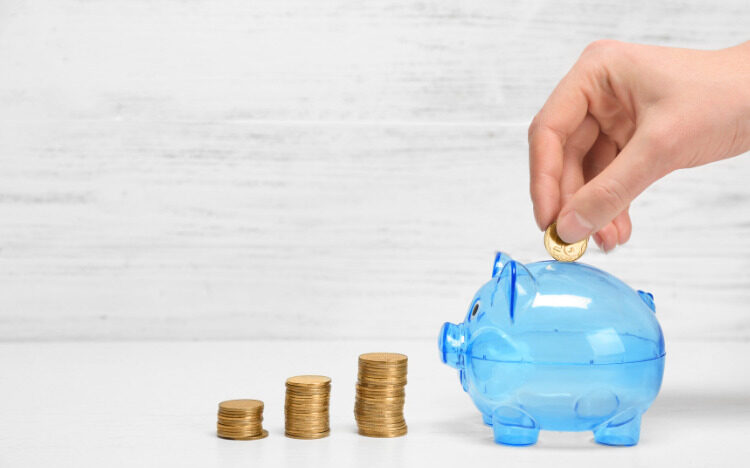 Piggy bank with piles of coins