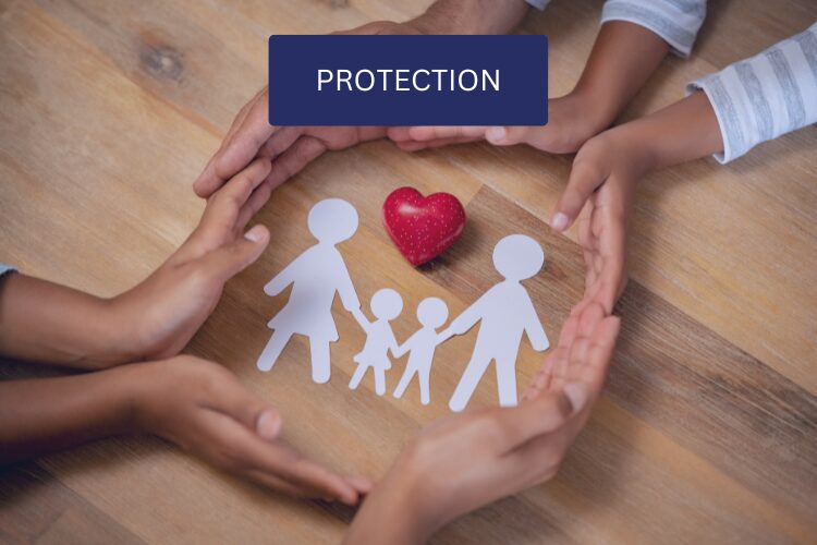 Paper family and red heart protected by hands