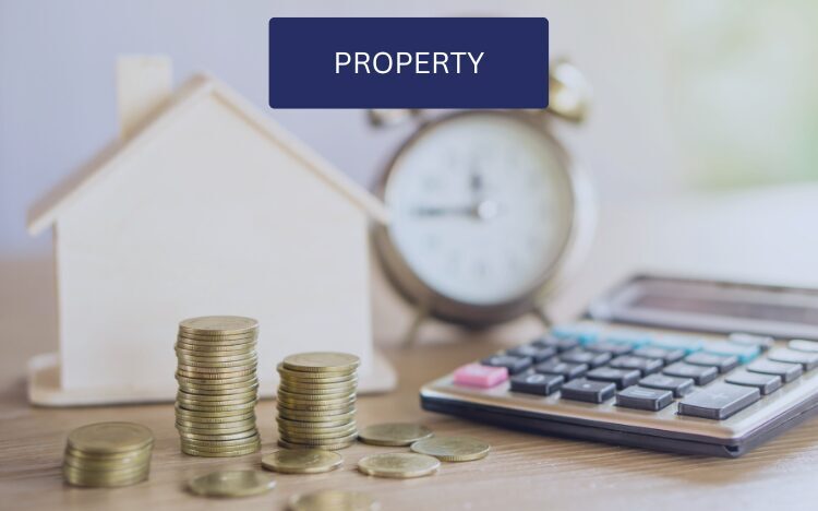 Table with calculator, coins, model property and clock