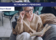 Older woman sat in her home, reading on the sofa