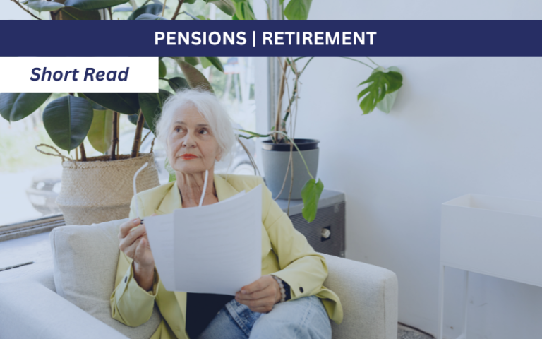 Older woman looking at paperwork thinking