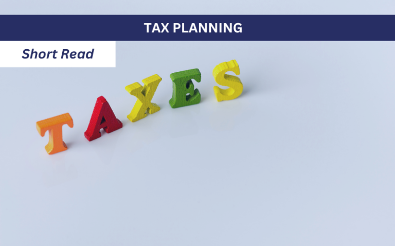 "Taxes" on colourful wooden letters